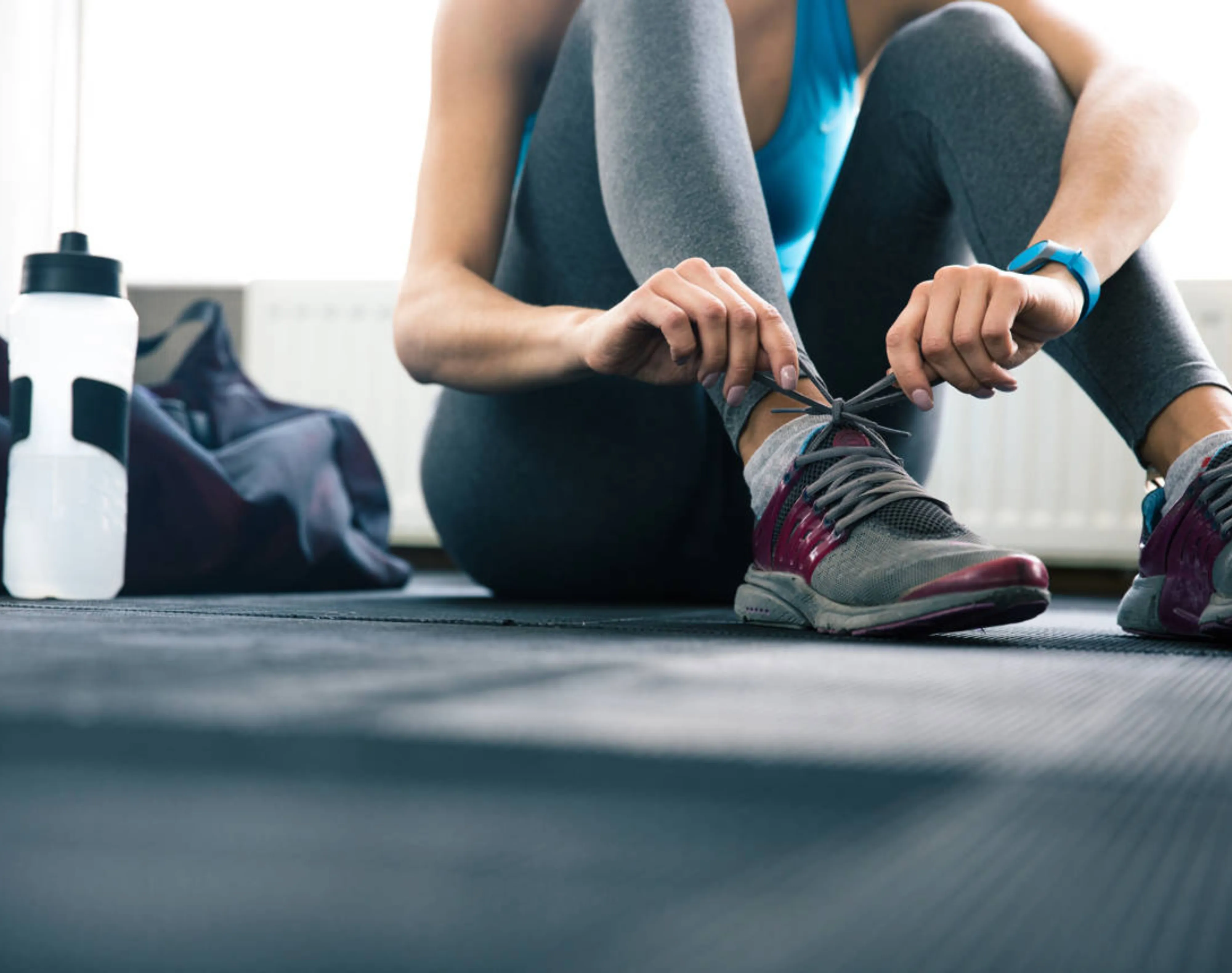 Woman Gym Putting Her Shoes